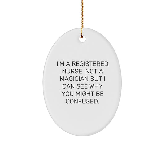 Gifts from Friends, Family, or Coworkers - 'I'm A Registered Nurse, Not A Magician...' Oval Ornament, White, 3.25' Tall, 1/8' Thick, for Registered Nurse, Men, Women, or Anyone Who Loves Christmas - Image 1