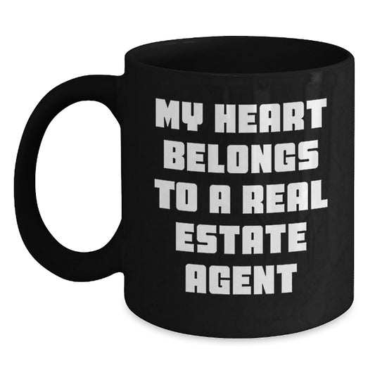 Funny Real Estate Agent Gifts from Friends for Christmas - My Heart Belongs To A Real Estate Agent Black Coffee Mug, 11oz or 15oz Capacity, Microwave and Dishwasher Safe, Ceramic - Main