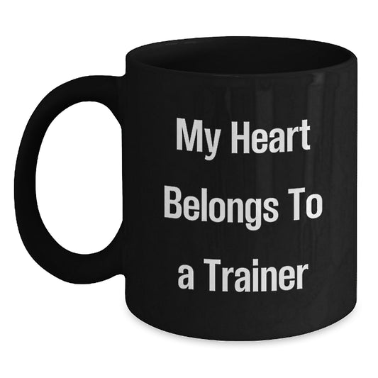 Funny Trainer Gifts for Him, Christmas Unique Mugs with My Heart Belongs To A Trainer Quote, Black Coffee Mug for Trainer Lovers - Main