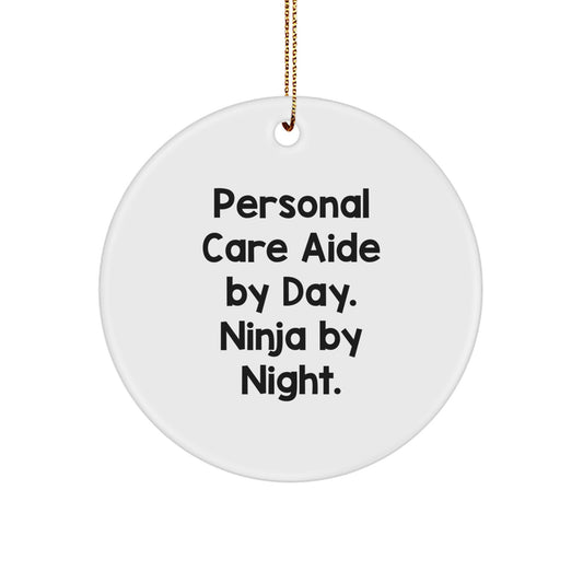 Personal Care Aide Gifts from Men, Women, or Anyone, Christmas Unique Ornaments for Personal Care Aide, Circle Ornament, Funny Quote, 'Ninja By Night.', - Image 1