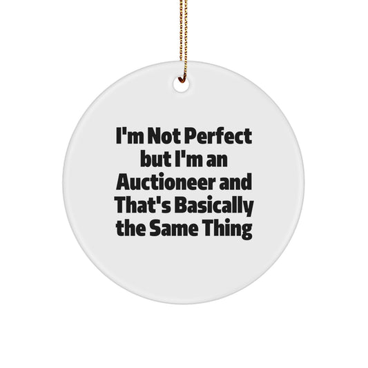 Funny Auctioneer Gift, Humorous Christmas Memorable Present for Auctioneer Friends, 'I'm Not Perfect But I'm An Auctioneer And That's Basically The Same Thing' Circle Ornament - Image 1
