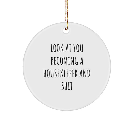 Funny Housekeeper Gifts for Her - Unique Circle Ornament from Friends and Family - 'Look At You Becoming A Housekeeper And Shit' Humorous Christmas Decoration - Image 1