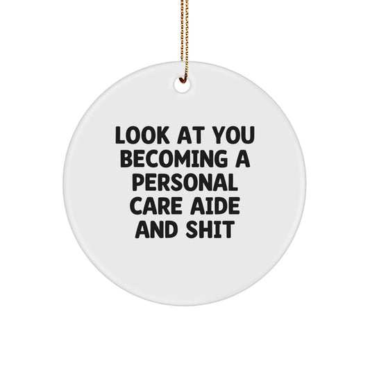 Funny Personal Care Aide Gifts from Friends, Christmas Unique Ornaments for Personal Care Aide Enthusiasts, Circle Ornament with 'Look At You Becoming A Personal Care Aide And Shit' Quote - Image 1