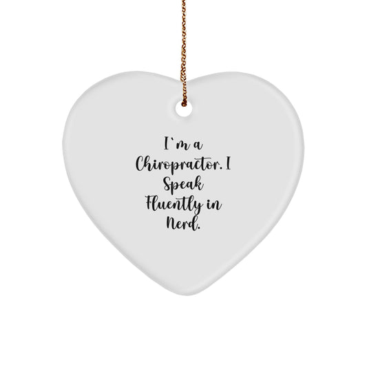 Charming Chiropractor Gifts for Christmas - 'I'm A Chiropractor. I Speak Fluently In genius.' Heart Ornament for Men, Women, or Friends from Family - Image 1