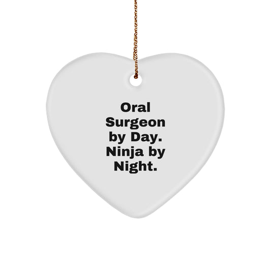 Funny Oral Surgeon Gifts from Men for Christmas Unique Oral Surgeon Heart Ornament - 'Oral Surgeon By Day. Ninja By Night.' - Image 1
