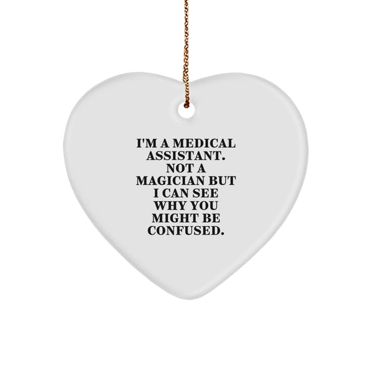 Medical Assistant Gifts from Friends for Christmas, Funny Heart Ornament, 'I'm A Medical Assistant. Not A Magician...' - Image 1