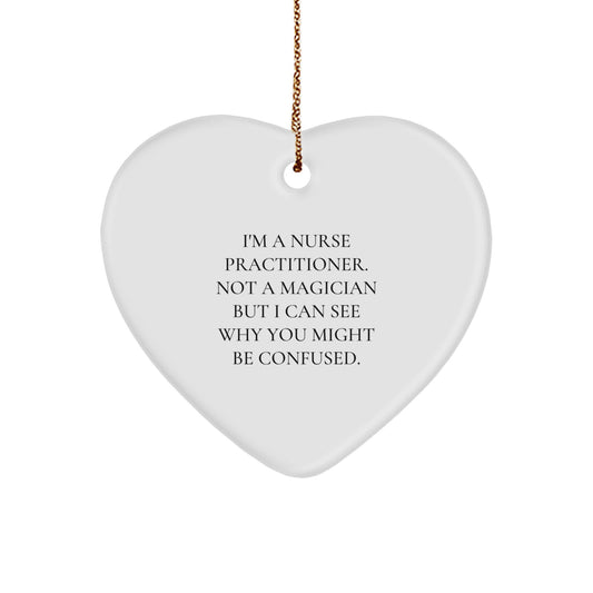 Funny Nurse Practitioner Gifts from Friends for Christmas - 'I'm A Nurse Practitioner. Not A Magician...' Heart Ornament - Image 1