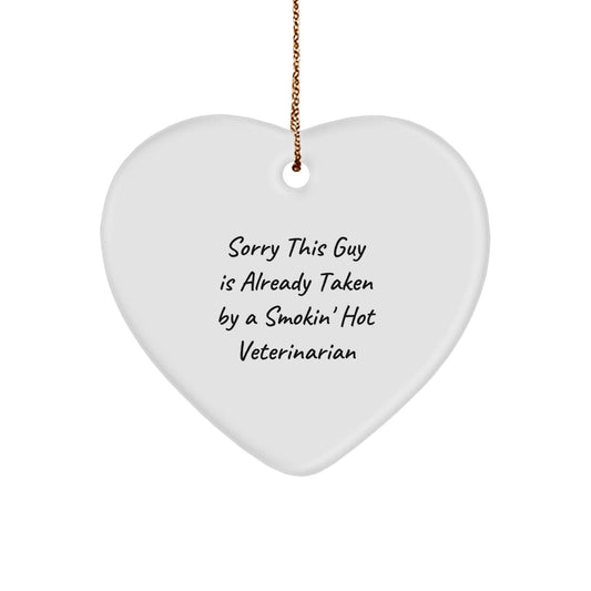 Funny Veterinarian Gifts for Christmas, Heart Ornament with 'Sorry This Guy Is Already Taken By A Smokin' Hot Veterinarian' Quote, Gifts from Friends or Family to Men or Women - Image 1