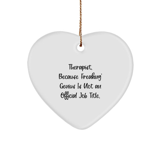 Funny Therapist Gifts from Friends for the Heart of the Matter, Christmas Unique Ornaments for Therapist, Heart Shaped Home Decor, 'Therapist. Because Freaking' genius Is Not An Official Job Title.' - Image 1