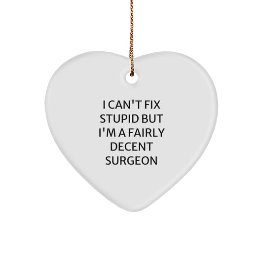 Funny Surgeon Gifts from Men Christmas Unique Gifts for Surgeons Heart Ornament, Humorous Surgeon Quote, I Can't Fix Stupid But I'm A Fairly Decent Surgeon, White Heart Shaped - Image 1