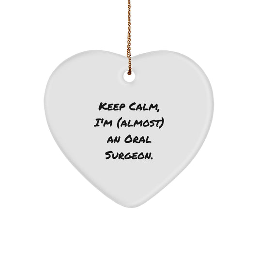 Funny Oral Surgeon Christmas Unique Gifts from Friends for Men, White Heart Ornament, 'Keep Calm, I'm (almost) An Oral Surgeon.' - Image 1