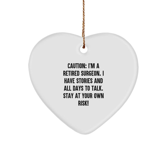 Funny Gift from Friends for Men Surgeon - Christmas Unique Heart Ornament with 'Caution: I'm A Retired Surgeon' Quote, White Color, Heart Shaped - Image 1