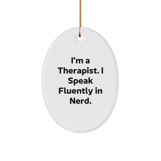 Funny Therapist Gifts from Men to Therapist Friends - Oval Ornament with 'I'm A Therapist. I Speak Fluently In genius.' Quote, Unique Christmas Decorations - Image 1