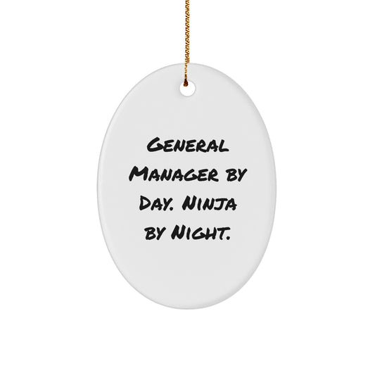 Funny General Manager Gift by General Manager By Day. Ninja By Night. Oval Ornament, Christmas Unique Gifts from Friends, Men, Women, Coworkers, Family for General Manager, Men, Women - Image 1