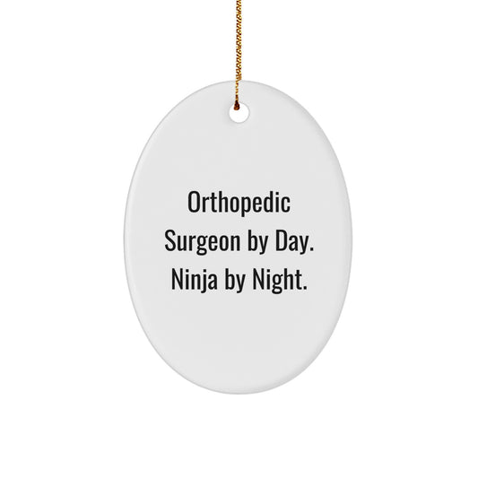 Orthopedic Surgeon Gifts, Oval Ornament, 'Orthopedic Surgeon By Day. Ninja By Night.' Funny Quote, Christmas Unique Gifts for Men, Women, Coworkers - Image 1