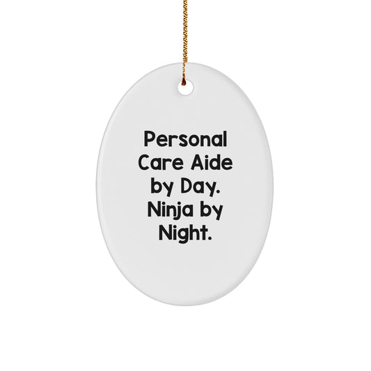 Personal Care Aide Gifts from Men, Funny Oval Ornament for Christmas Unique Gifts for Personal Care Aide By Day. Ninja By Night. - Image 1