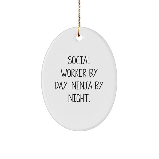 Funny Social Worker Gifts from Family - Social Worker By Day. Ninja By Night. Oval Ornament for Social Worker Men Women Friends Coworkers - Image 1