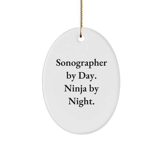 Sonographer Gifts, Funny Oval Ornament, 'Sonographer By Day. Ninja By Night.' - Gifts from Family to Friends for Christmas - Image 1