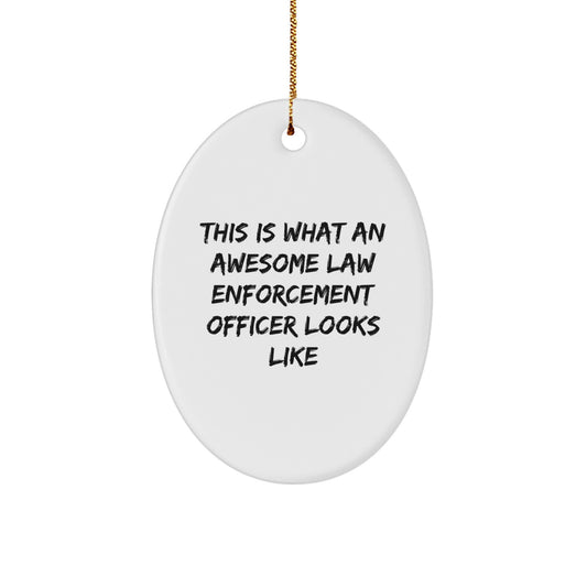 Funny Law Enforcement Officer Gifts from Men for Christmas Unique Presents, Oval Ornament Law Enforcement Officer Look Great This Is What An Awesome Officer Looks Like - Image 1