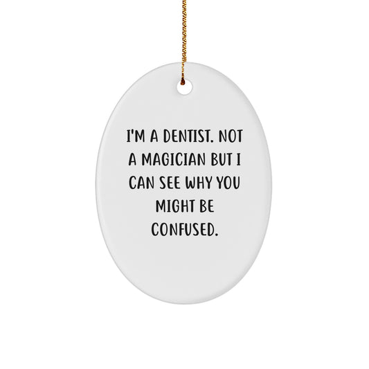 Funny Dentist Gifts from Friends for Dentists I'm A Dentist Not A Magician But I Can See Why You Might Be Confused Christmas Oval Ornament - Image 1