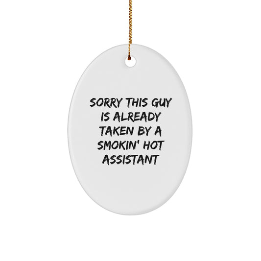 Funny Assistant Oval Ornament Gifts for Men, Women Friends Family, Christmas Unique Ornaments, 'Sorry This Guy Is Already Taken By A Smokin' Hot Assistant' - Image 1