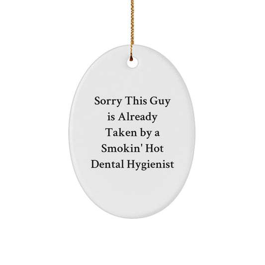 Dental Hygienist Gifts, Sorry This Guy Is Already Taken By A Smokin' Hot Dental Hygienist Oval Ornament, Funny Christmas Unique Gift for Friends, Family, or Coworkers - Image 1