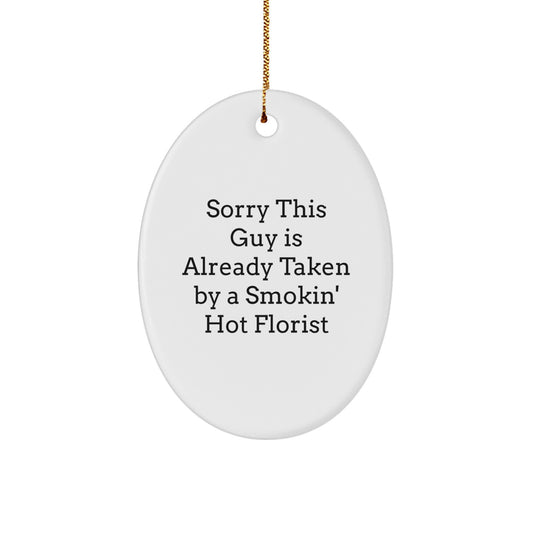 Funny Florist Gifts for Her - White Oval Ornament with 'Sorry This Guy Is Already Taken By A Smokin' Hot Florist' Quote - Gifts from Friends for Christmas - Image 1