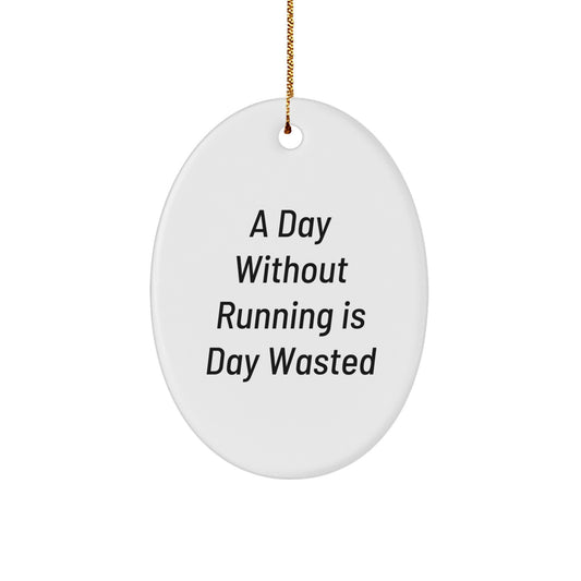 Funny Running Gifts from Friends for Christmas - Oval Ornament - 'A Day Without Running Is Day Wasted' - Image 1