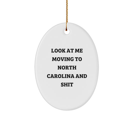 Funny North Carolina Oval Ornament Gifts from Men to North Carolina Residents, Perfect for Christmas Decorations - Look At Me Moving To North Carolina And Shit - Image 1