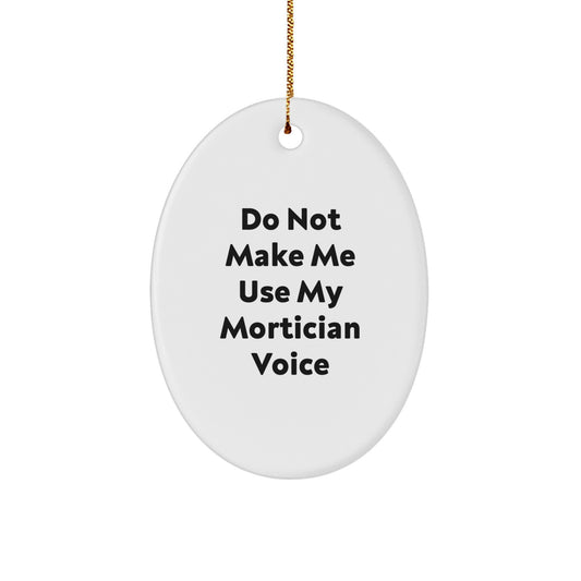 Unique Funny Mortician Gifts from Men for Mortician Christmas Decorations - 'Do Not Make Me Use My Mortician Voice' Oval Ornament - Image 1