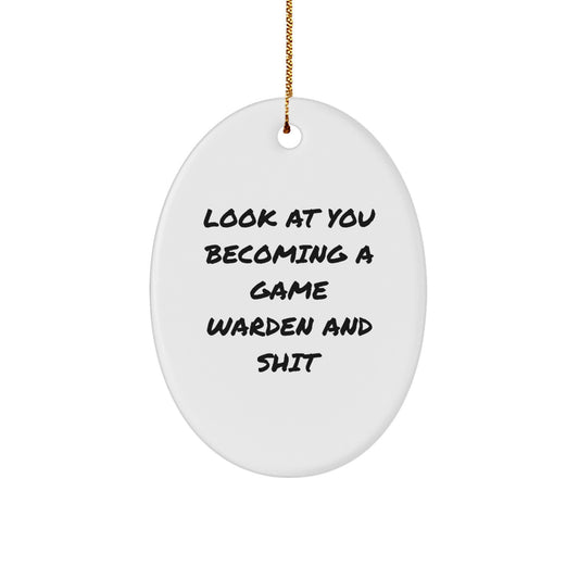 Funny Game Warden Oval Ornament Gifts from Friends for Men, Unique Christmas Decorations, Oval Ornament Quote 'Look At You Becoming A Game Warden And Shit' - Image 1