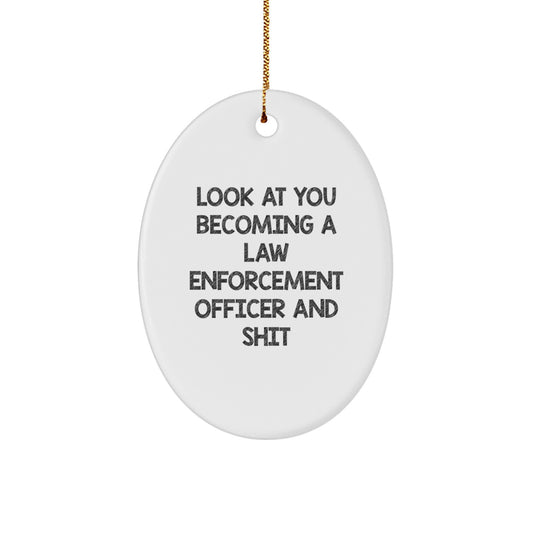 Funny Law Enforcement Officer Gifts for Him, Christmas Unique Gifts from Men, Oval Ornament with Look At You Becoming A Law Enforcement Officer And Shit Humor - Image 1