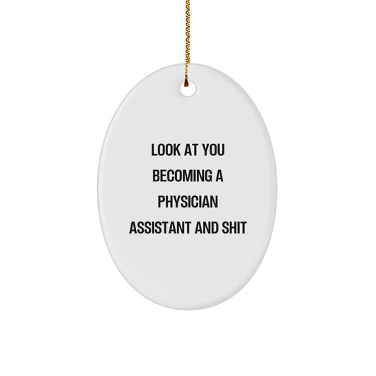 Gifts from Family, Friends, or Coworkers to Physician Assistant, Funny Oval Ornament for Christmas Unique Decorations - Look At You Becoming A Physician Assistant And Shit - Image 1