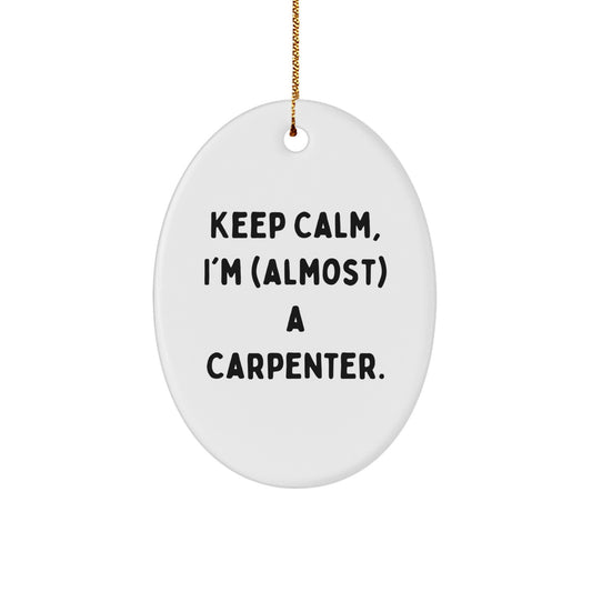 Funny Christmas Unique Gifts for Men - Oval Ornament, 'Keep Calm, I'm (almost) A Carpenter' - Gifts from Friends and Family to Carpenter - Image 1