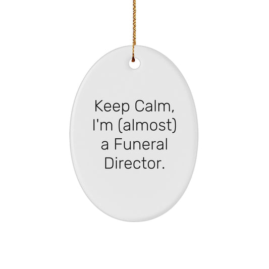 Funny Funeral Director Gifts, Oval Ornament Inspired by 'Keep Calm I'm (almost) A Funeral Director' for Christmas Unique Gifts from Family to Funeral Director Friends - Image 1