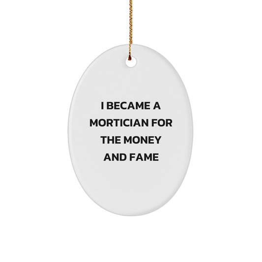 Funny Mortician Oval Ornament Gifts from Friends and Family for Morticians at Christmas - 'I Became A Mortician For The Money And Fame' Quote - Image 1