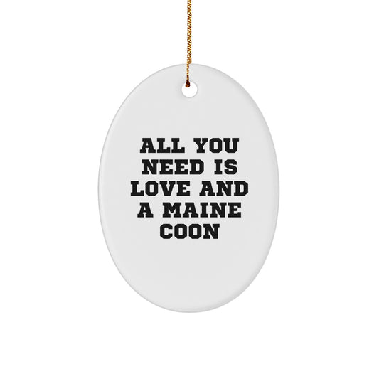 Funny Maine Coon Cat Oval Ornament Gifts from Family for Christmas, 'All You Need Is Love And A Maine Coon' Quote, Perfect for Maine Coon Cat Lovers, White, Oval Shaped, 3.25 inches tall - Image 1
