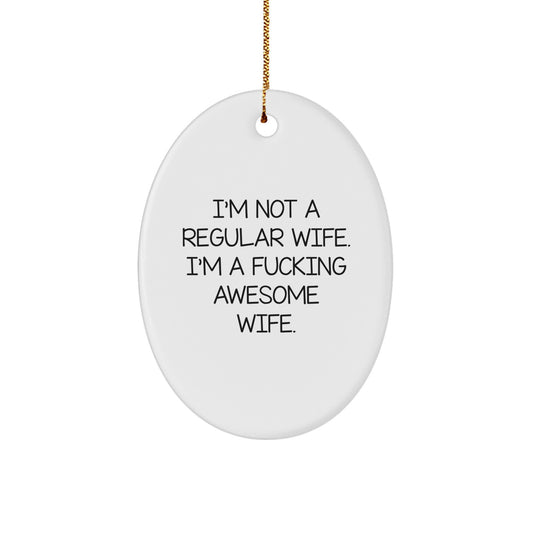 Funny Wife Gifts - 'I'm Not A Regular Wife. I'm A F--king Awesome Wife.' Oval Ornament, White, 3.25' Tall, Gifts from Men to Wife, Christmas Unique Gifts - Image 1